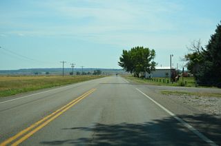 M-311 leaves Hysham south beyond Lions Club Park and 7th Avenue.
