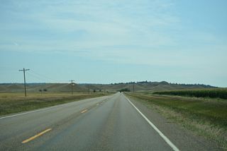 Advancing south across farmland, S-311 shifts southeast to meet Interstate 94 on bluffs west of Miller Coulee.