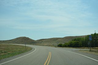 Advancing south across farmland, S-311 shifts southeast to meet Interstate 94 on bluffs west of Miller Coulee.