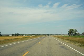 S-311 runs north across farm land from Cut Across Road to Hysham.