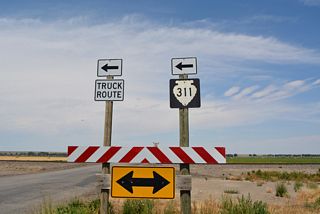 S-311 turns west onto Pioneer Avenue at Old Highway 10.