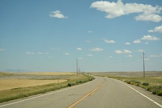 S-343 traverses ranch land east from Oilmont.