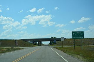 Interstate 15 travels north from Oilmont to Sweet Grass and Alberta Highway 4 to Lethbridge, Canada.