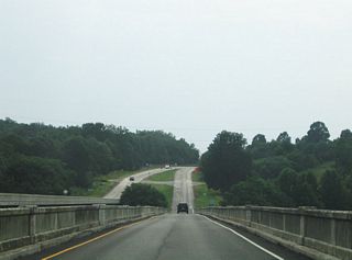 The Pee Dee River separates Montgomery and Stanly Counties. NC 24/27 exit Montgomery County after a 21.8 mile drive.
