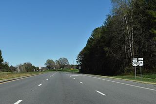 The eastbound roadway for U.S. 74 runs between the roadways of I-85/U.S. 29 for 0.73 miles before turning east away from the freeway.