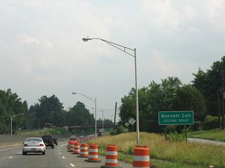 McConnell Road spans U.S. 29-70-220 just north of the cloverleaf interchange with Gate City Boulevard (old NC 6) east of Bennett College.
