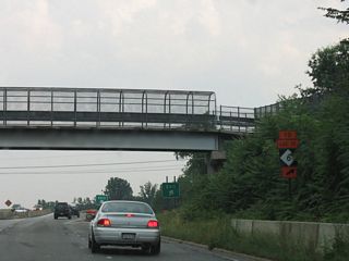 Formerly Lee Street, Gate City Boulevard (SR 4240) was part of NC 6, an eight mile long loop north from Interstate 40 through southern reaches of the Greensboro central business district. NC 6 was decommissioned in 2005.