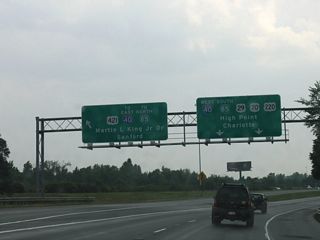 U.S. 29-220 partition into ramps for I-40 west and Martin Luther King Jr. Drive (Old U.S. 421) south to I-40 east. U.S. 29 overlaps with I-40 west for 1.48 miles.
