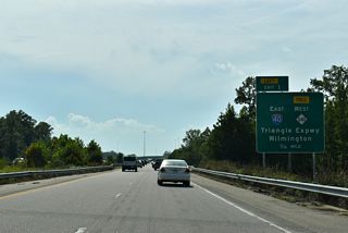 U.S. 70 originally combined with I-40 west at a trumpet interchange (Exit 318).