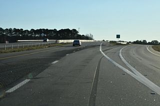 The diamond interchange (Exit 330) with Wilson's Mill Road (SR 1913) opened to traffic in 2024.
