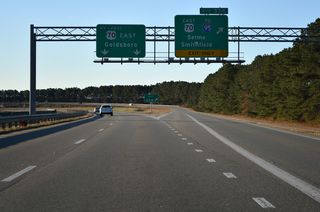 U.S. 70 meets Interstate 95 at a six-ramp parclo interchange before returning to the freeway along U.S. 70 Bypass.