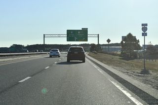 Beyond Community Drive (SR 1237), U.S. 70 upgrades to a limited access freeway.