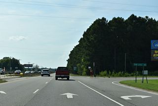 Peedin Road (SR 2309) heads north from an RIRO intersection with U.S. 70 to Pine Level.