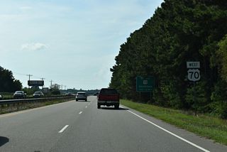 Cross traffic at Peedin Road north and Creech's Mill Road (SR 2597) south was eliminated at U.S. 70 by 2018.