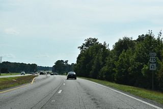 The U-turn west of Holts Pond allows motorists from Pondfield Road (SR 2314) south to access U.S. 70 eastbound.