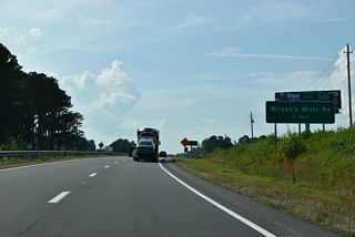 The diamond interchange (Exit 330) joining U.S. 70 with Wilson's Mill Road (SR 1913) opened to traffic in 2024.