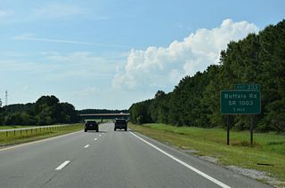 Exit 333 to Buffalo Road (SR 1003) follows the return of U.S. 70 west from Selma.