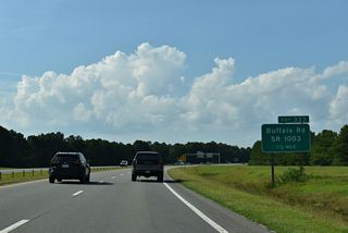 U.S. 70 rejoins the freeway along U.S. 70 Bypass a half mile ahead of the parclo interchange (Exit 333) with Buffalo Road (SR 1003).