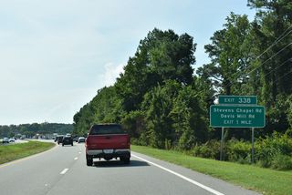 Davis Mill Road (SR 2310) south and Steven's Chapel Road (SR 2310) north come together a the folded diamond interchange (Exit 338) with U.S. 70 in one mile.