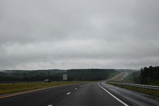The Rockingham Bypass traverses hilly terrain northwest of Rockingham and south of Coggins Hill.