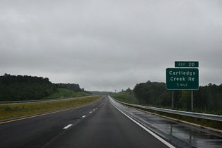 Cartledge Creek Road (SR 1005) heads 2.3 miles north from U.S. 74 Business to I-73/74 at Exit 20.