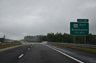 Exit 22 links I-73/74 north with U.S. 220 south back to Rockingham in 1.5 miles.