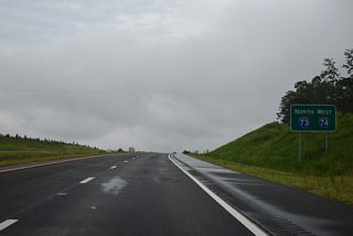 Confirming sign for I-73/74 north posted by the disconnected sections of Dave Kings Road (SR 1303).