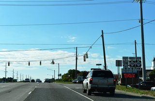 NC 200 follows U.S. 74 east through Monroe before branching north to Locust and Concord.