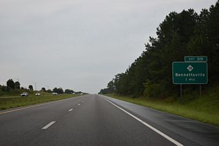The diamond interchange at Exit 319 joins Interstate 74 with NC 38 in one mile.