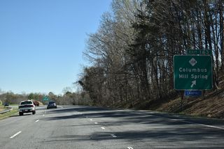 Exit 163 departs U.S. 74 east for NC 108 outside the town of Columbus. The state route continues north five miles to Mill Spring and 19 miles to Rutherfordton.