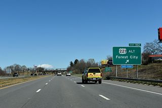U.S. 221 Alternate parallels U.S. 221 to the east through Spindale, Forest City, Alexander Mills, Caroleen, Henrietta, Cliffside and Chesnee, South Carolina.