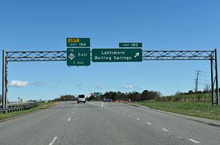 Exit 193 leaves U.S. 74 east for Peachtree Road (SR 1162) north to Lattimore. The Shelby Bypass (SR 9000) separates from Dixon Boulevard next at a trumpet interchange. The 5.6 mile segment of the bypass opened from Peachtree Road to NC 226 on April 13, 2020.