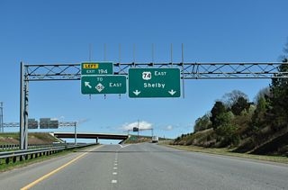Assigned Left Exit 194, the Shelby Bypass stretches 10.0 miles east around the north side of Shelby to NC 150 (Cherryville Road).Inventoried as SR 9000, the future alignment of U.S. 74 is not shielded.