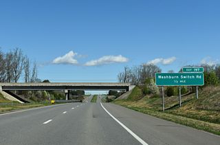 Washburn Switch Road heads 1.38 miles south from the Shelby Bypass to U.S. 74 (Dixon Boulevard) at Poplar Springs Church Road (SR 1151).