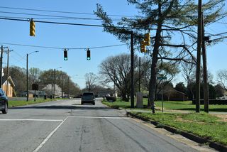 Borders Road (SR 2047) heads west from Kings Mountain Reservoir to U.S. 74 Business (Marion Street) across from Cox Road.