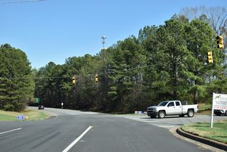 U.S. 74 Business expands into separate roadways at Canterbury Road for the wye interchange with U.S. 74.