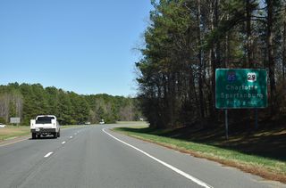 The exit ramps to I-85/U.S. 29 depart from the freeway along U.S. 74 just 0.18 miles east of the U.S. 74 Business entrance ramp.