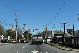 U.S. 74 Business (King Street) spans two sets of Norfolk Southern Railroad tracks between Railroad Avenue and NC 216 (Battleground Avenue).