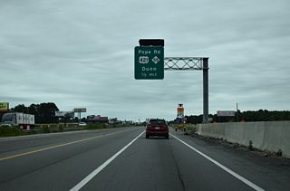 Expansion of I-95 consolidated Exit 72 with Pope Road and Exit 73 with U.S. 421/NC 55 (E Cumberland Street) into a split diamond interchange. U.S. 421/NC 55 overlap 5.1 miles west through Downtown Dunn to the town of Erwin.