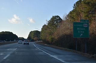 Exit 121 leaves I-95 south after Bloomery Swamp for U.S. 264 Alternate (Raleigh Road Parkway). 