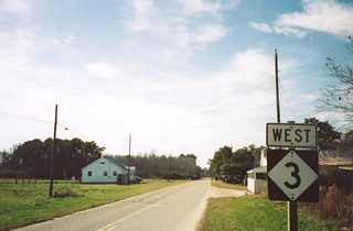 There was only one NC 3 shield posted in each direction of the state route between Bertha and Poplar Branch in 2001. The westbound assembly stood just beyond the Poplar Branch boat ramp to Currituck Sound.