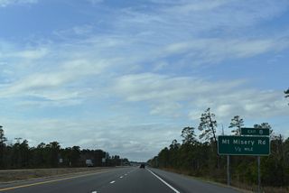 Mt. Misery Road (SR 1426) arcs southwest from Exit 8 to Eastbrook and U.S. 74/76 at Lanvale Road.