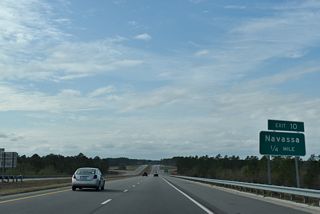 Cedar Hill Road (SR 1430) arcs northwest from Old Mill Road (SR 1432) to Mt. Misery Road (SR 1426) through the town of Navassa.