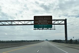 Wilmington is home to a number of attractions including the USS North Carolina Battleship Memorial, Fort Fisher and its North Carolina Aquarium via U.S. 421 south. U.S. 421 also connects with the State Port at the south end of U.S. 117.