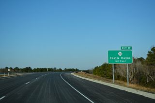 NC 133 (Castle Hayne Road) travels south through Wrightsboro to Hightsville and Wilmington International Airport (ILM).