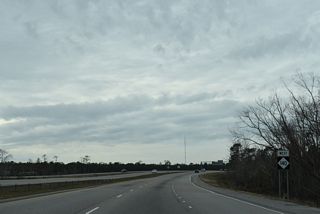 Confirming marker for NC 140 west of Kirkland and Island Creek. Construction for Military Cutoff Road Extension got underway along the ensuing stretch in 2018. 