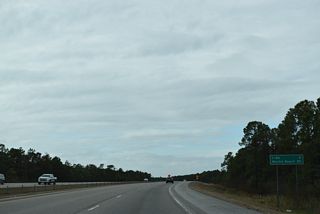 A cloverstack interchange will join NC 140 with the Hampstead Bypass north and Military Cutoff Road Extension south to Market Street. The future 13 mile long freeway for U.S. 17 will extend northeast into Pender County.1
