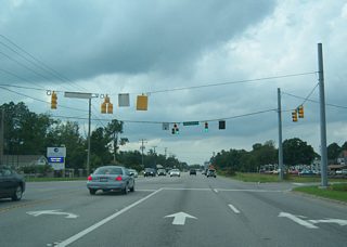 Puddin Ridge Road intersects NC 168 (Caratoke Highway) at one of the traffic lights within the community of Moyock.