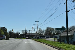 Branching east from U.S. 74 Business, Elizabeth Avenue (SR 2052) crosses NC 180 (Post Road) along a 2.80 mile course to Kings Mountain Reservoir.
