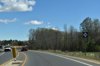 NC 180 reassurance marker posted south of NC 150 (Cherryville Road).